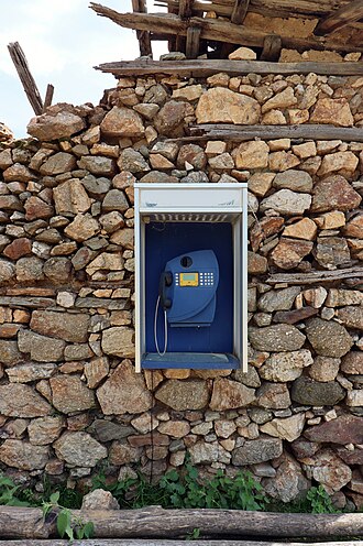 A telephone booth in the village of Stinik