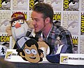 X is the puppet, the cut-out and the convention logos