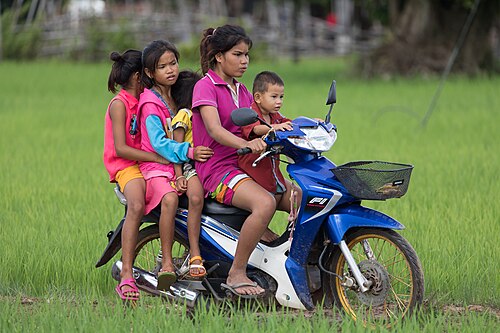 Five children on a motorcycle