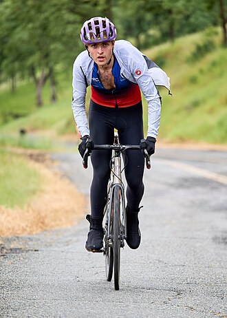 A member of the Chico Cycling Team is seen riding up Table Mountain during the 2025 Chico Wildflower Century in Butte County, California