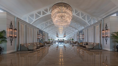 Lobby hall with couches and chandelier at The Fullerton Bay Hotel, Singapore